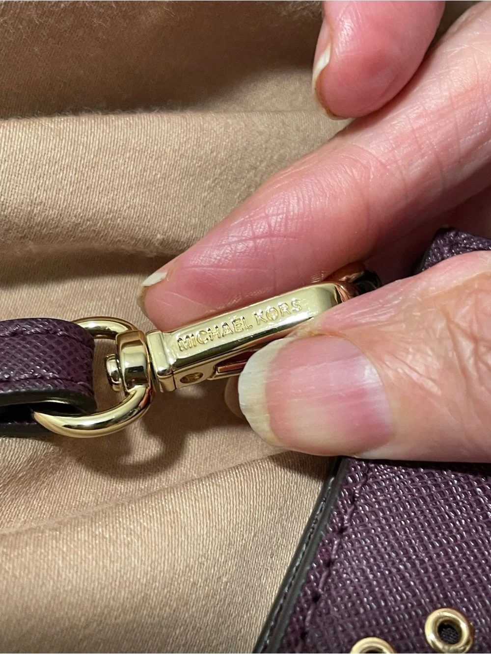 MICHAEL KORS  Brooklyn Plum Wristlet with Gold Eyelet Detail